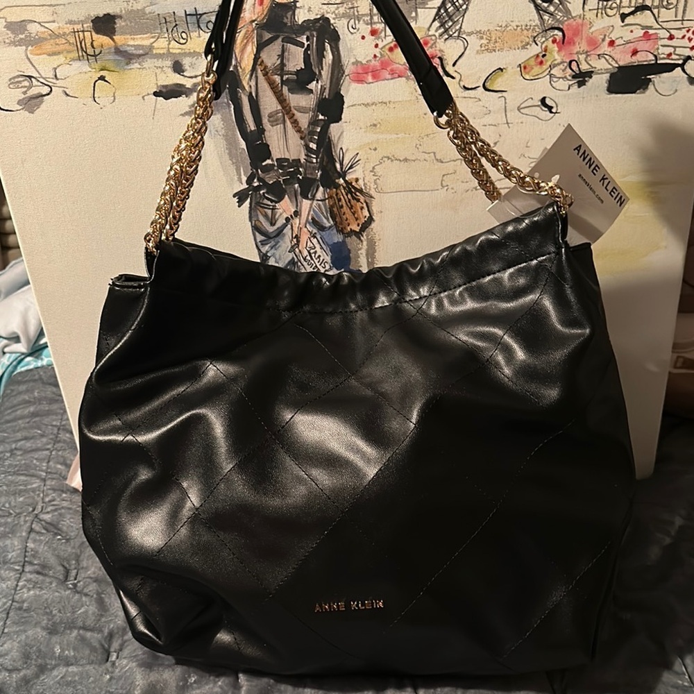 Anne Klein’s soft quilted  black hobo bag